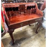 A reproduction George III style mahogany desk, width 103cm depth 60cm height 104cm