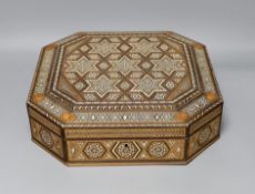 A Moroccan inlaid bone and mother of pearl hexagonal casket, 33 x 33cm