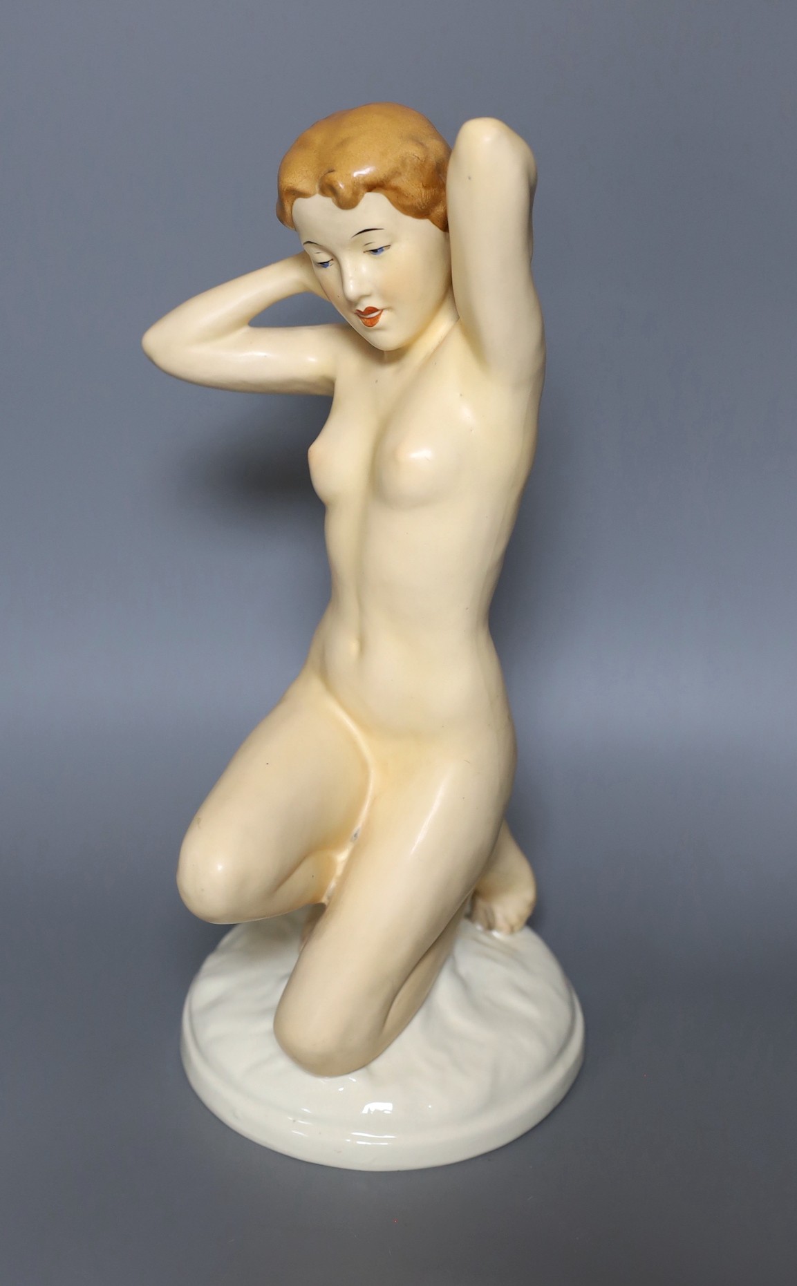 A Royal Dux porcelain figure of a nude lady, 35cm