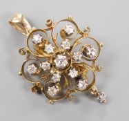 An Edwardian pierced 15ct and diamond cluster set drop pendant brooch, 24mm, gross weight 6.1