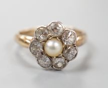 A late Victorian yellow metal, single stone split pearl and seven stone diamond set circular cluster