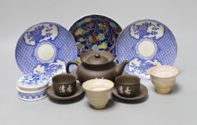 A selection of Oriental items, to include blue and white Japanese saucers, two stoneware tea