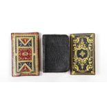 ° ° An 18th century miniature book and two others