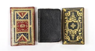 ° ° An 18th century miniature book and two others