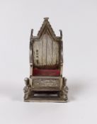An Edwardian novelty silver mounted pin cushion, modelled a s Coronation throne, Levi & Salaman,