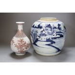 A Chinese Qing blue and white ginger jar with a painted landscape and a blue and copper-red pear