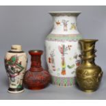 A Chinese crackle glaze ‘warriors’ vase, a famille rose ‘hundred antiques’ vase, a ‘cinnabar’