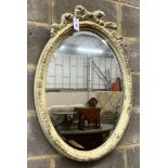 A Victorian style oval painted wall mirror, width 58cm, height 84cm