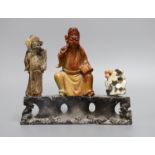 A Chinese soapstone deity figure group, 20cm wide