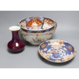 An 18th century Japanese Imari dish (af), another Imari dish, an 18th century Chinese export bowl (