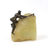 A small 20th century bronze of a climber on onyx, 8cm
