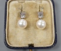 A pair of 18ct white metal, cultured pearl and diamond set drop earrings, 17mm, gross weight 4.3