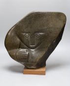 A Zimbabwean carved and polished stone abstract study of a head with a fist, 35cms.
