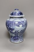 A 19th century Chinese blue and white lidded baluster vase, 28cm tall