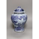 A 19th century Chinese blue and white lidded baluster vase, 28cm tall