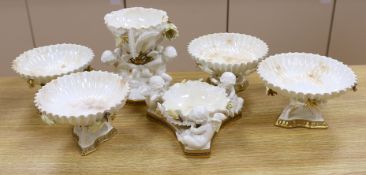 Six pieces of Moore Bros. white glazed gilt edged porcelain, including a set of four comport, 20cm