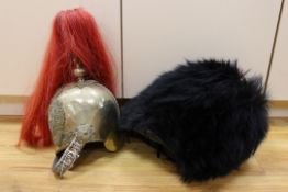 A Royal Horseguard's helmet and Queen’s guard bearskin