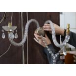 Five pairs of gilt metal and glass two branch wall lights, largest 33cm