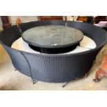 A large Westminster black all weather rattan circular topped garden table, diameter 180cm, height