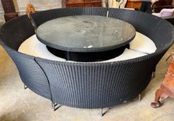 A large Westminster black all weather rattan circular topped garden table, diameter 180cm, height