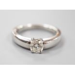 A modern platinum and solitaire diamond ring, size M, gross weight 8.7 grams, the diamond weighing