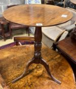 A George III mahogany circular top tripod wine table, diameter 50cm, height 69cm