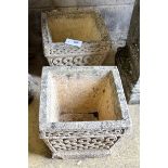 A pair of small reconstituted stone square garden planters, width 30cm, height 25cm