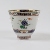 A Chinese Kangxi famille verte tea bowl (hairline crack)