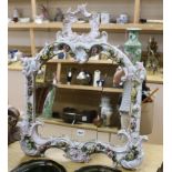 A German Dresden-style ornamental porcelain easel mirror, 70cm tall