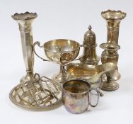 Assorted silver ware including a pair of George V spill vases, a small vase, a two handled trophy