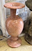 A reconstituted marble urn, height 70cm