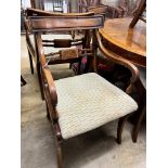 A set of six Regency style mahogany dining chairs, two with arms