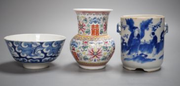 An early 20th century Chinese famille rose vase, a Chinese blue and white jar, lacking cover and a
