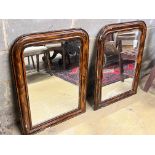 A pair of Victorian wall mirrors with painted simulated grain, width 60cm, height 81cm