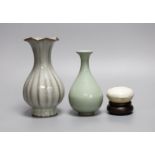 A Chinese celadon ground bottle vase, a similar crackle glazed vase, a paste box with cover and