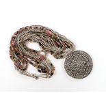 Kai-Yin-Lo of Hong Kong- a white metal and multi strand gem bead set pendant necklace, approx.