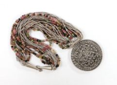Kai-Yin-Lo of Hong Kong- a white metal and multi strand gem bead set pendant necklace, approx.