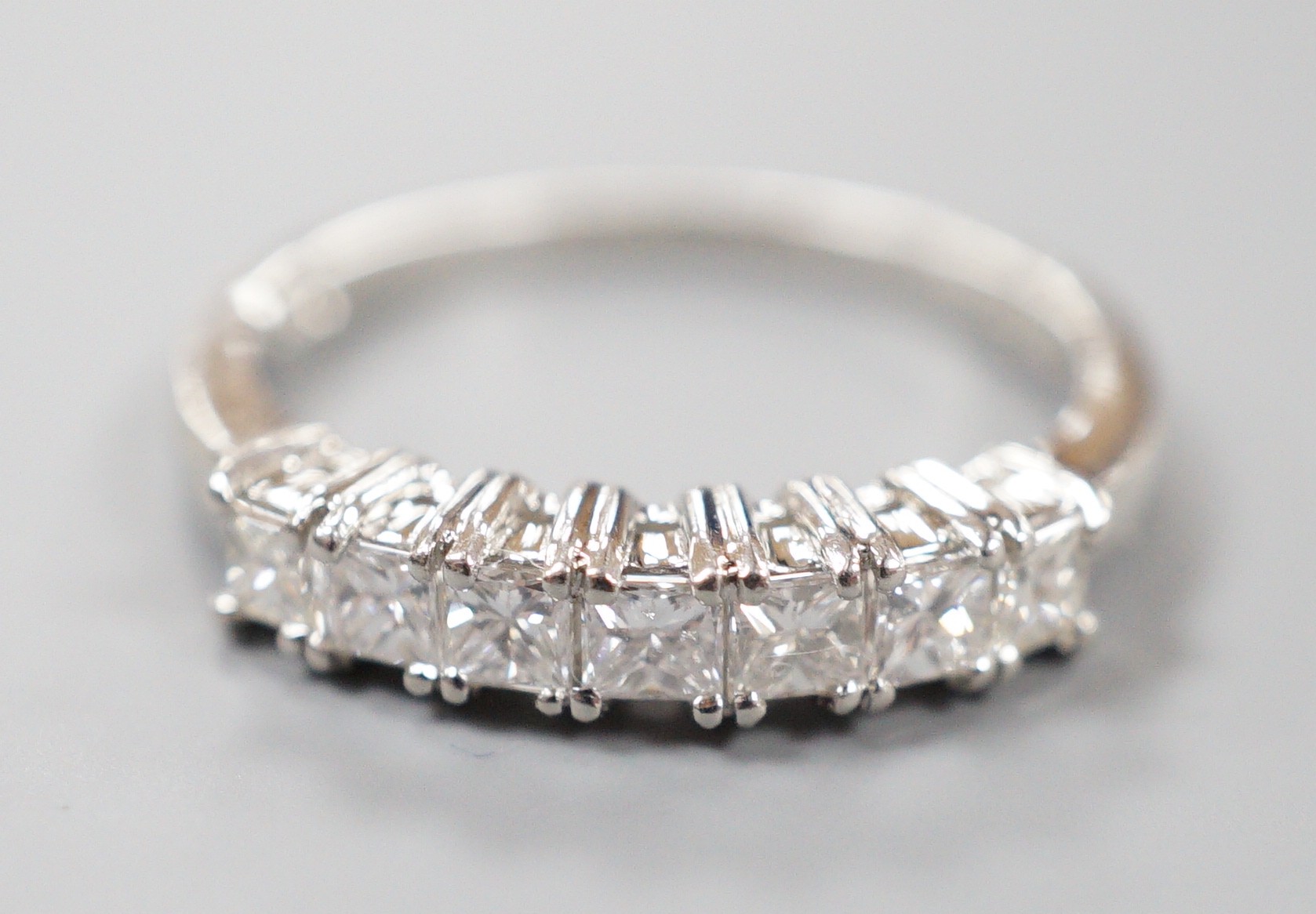 A modern platinum and seven stone princess cut diamond set half hoop ring, size M/N, gross weight - Image 2 of 4