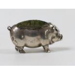 An Edwardian novelty silver mounted pin cushion, modelled as a pig, Levi & Salaman, Birmingham,