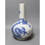 A Chinese blue and white dragon bottle vase, 37cm tall