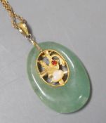 A gilt metal and gem set mounted oval adventurine quartz? pendant, 36mm, on a 9ct chain, 46cm, gross