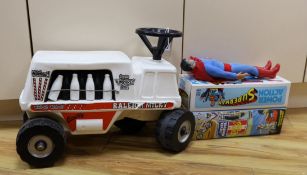 A Denys Fisher Superman, rare, in original box, another unboxed, a Unigate milk float with bottles,