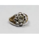 An early 19th century gold overlay and silver, rose diamond cluster ring, size P, gross 6.3 grams