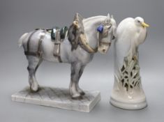 A Royal Copenhagen ceramic model of a shire horse, signed and dated and a similar crane, both
