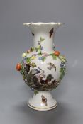 A 19th century Meissen floral encrusted vase decorated with birds and insects, 22cm