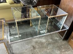 A nest of three contemporary gilt metal and glass tables, length 85cm, depth 45cm, height 40cm,