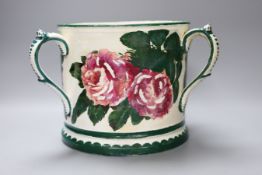 A large Wemyss three handled green and white tankard vase with floral decoration (restored), 19cm