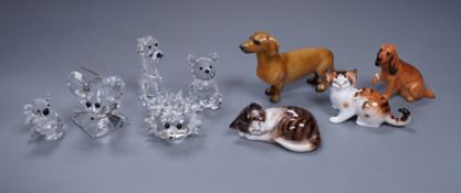 A group of Swarovski crystal (5) and four porcelain animal models, three Doulton and one Rosenthal