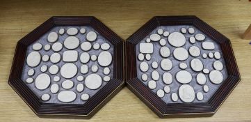 After the antique, a pair of octagonal framed grand tour plaster plaques, 44 x 44cm total