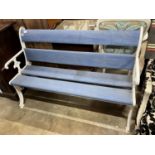 A Victorian style painted cast iron and wooden slatted garden bench, length 131cm, depth 54cm,